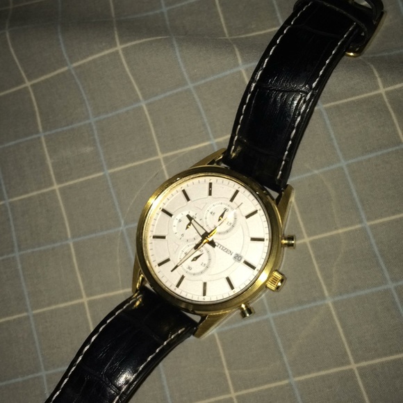 Golden watch, comes with box, stand, instructions